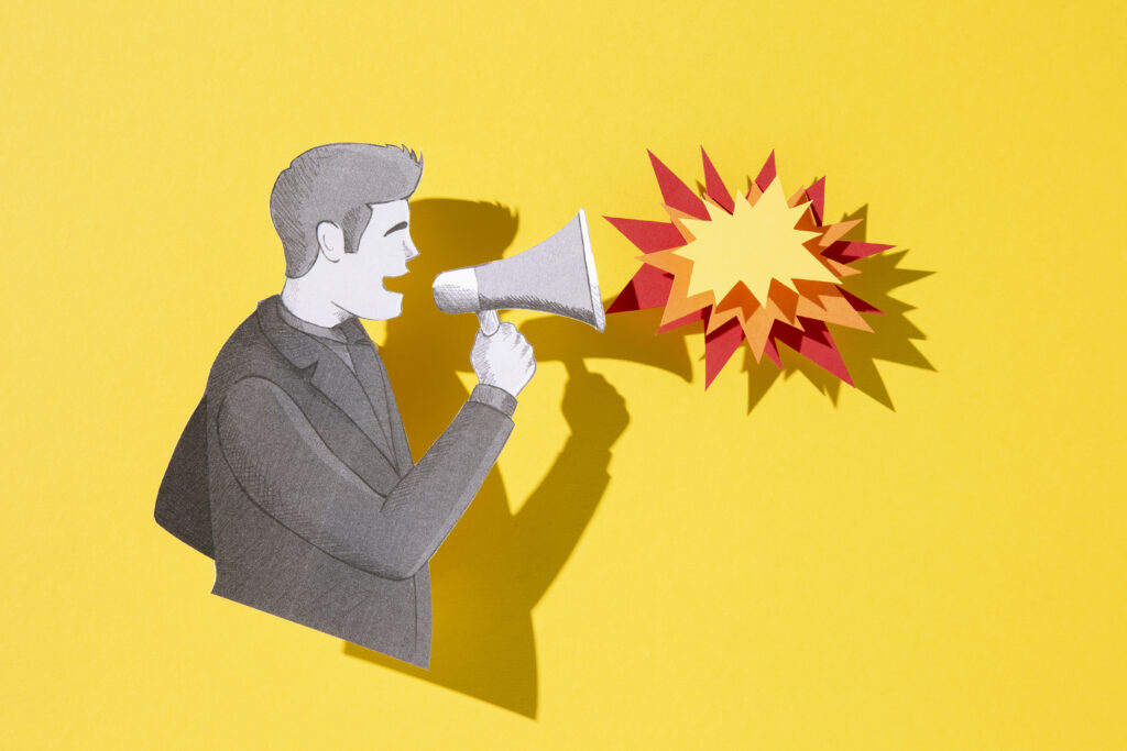 Illustration of a man shouting through a megaphone with a colourful explosion shape coming out, on a bright yellow background.